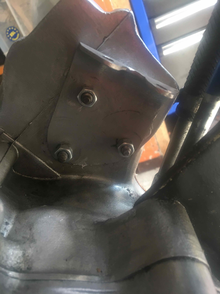 Bracket on timing chest blocks useless hole