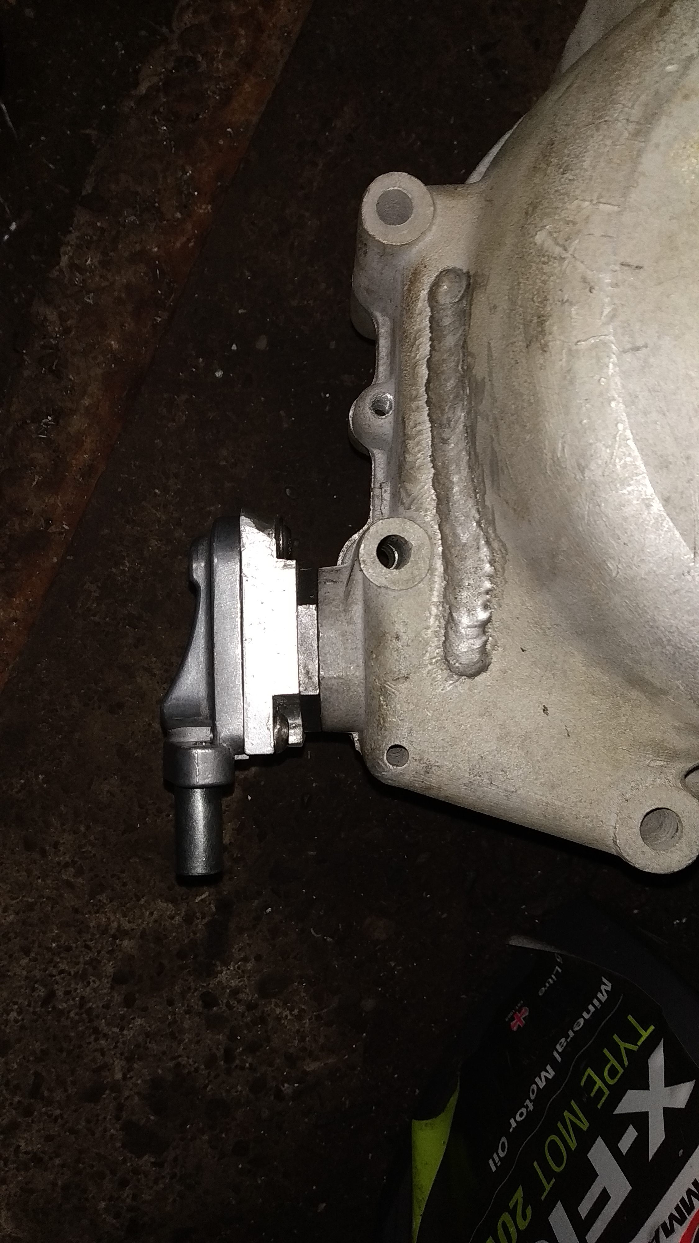 Outside EGR valve on standard sump plug